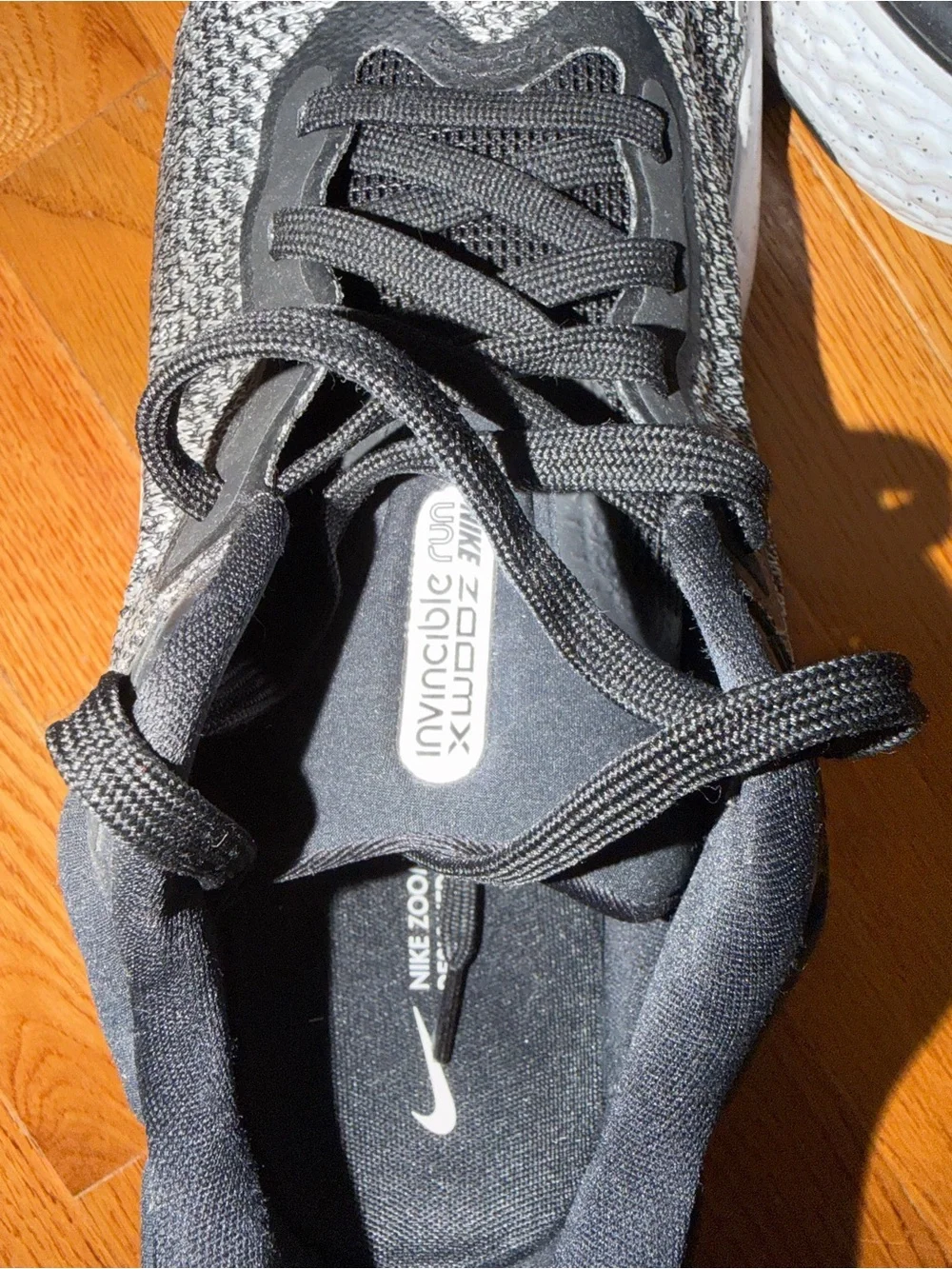 Nike Black and White Flyknit Running Shoe Interior